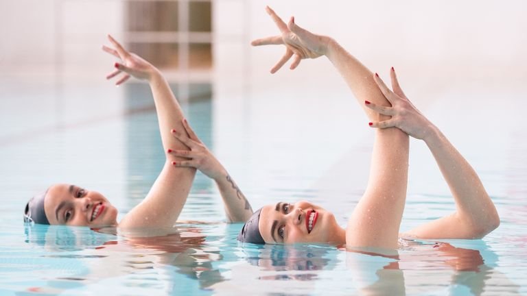 Rebecca Richardson and Genevieve Florence (pictured) are among members of the Aquabatix synchronized swimming team who hit the pool at Clissold Leisure Center, north London 