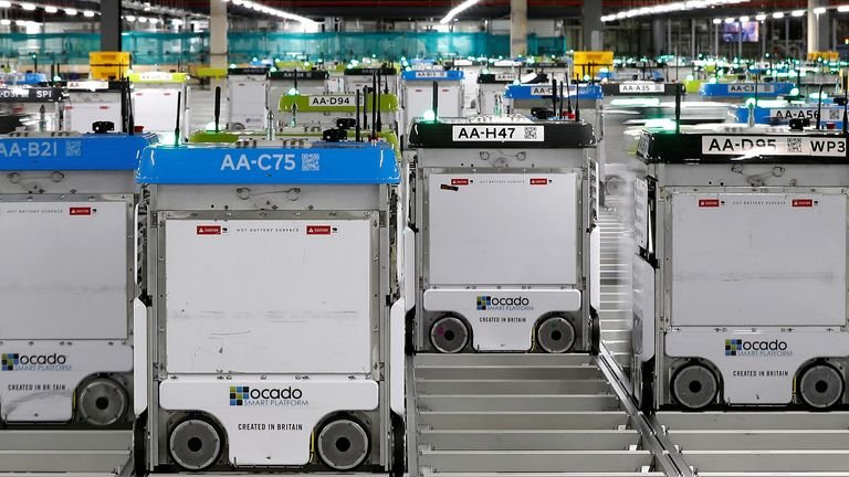  "Bots" are visible on the grid of the "smart platform" at the Ocado CFC (Customer Fulfillment Center) in Andover, Great Britain on May 1, 2018.