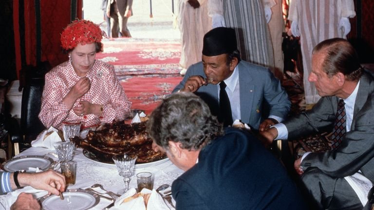 Prince Philip and the Queen eating lamb in Morocco.  Photo: Anwar Hussein