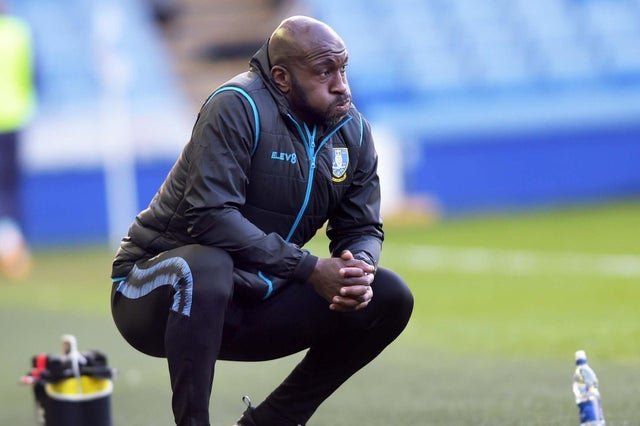 Sheffield Wednesday's Darren Moore has missed three games after testing positive for COVID-19.