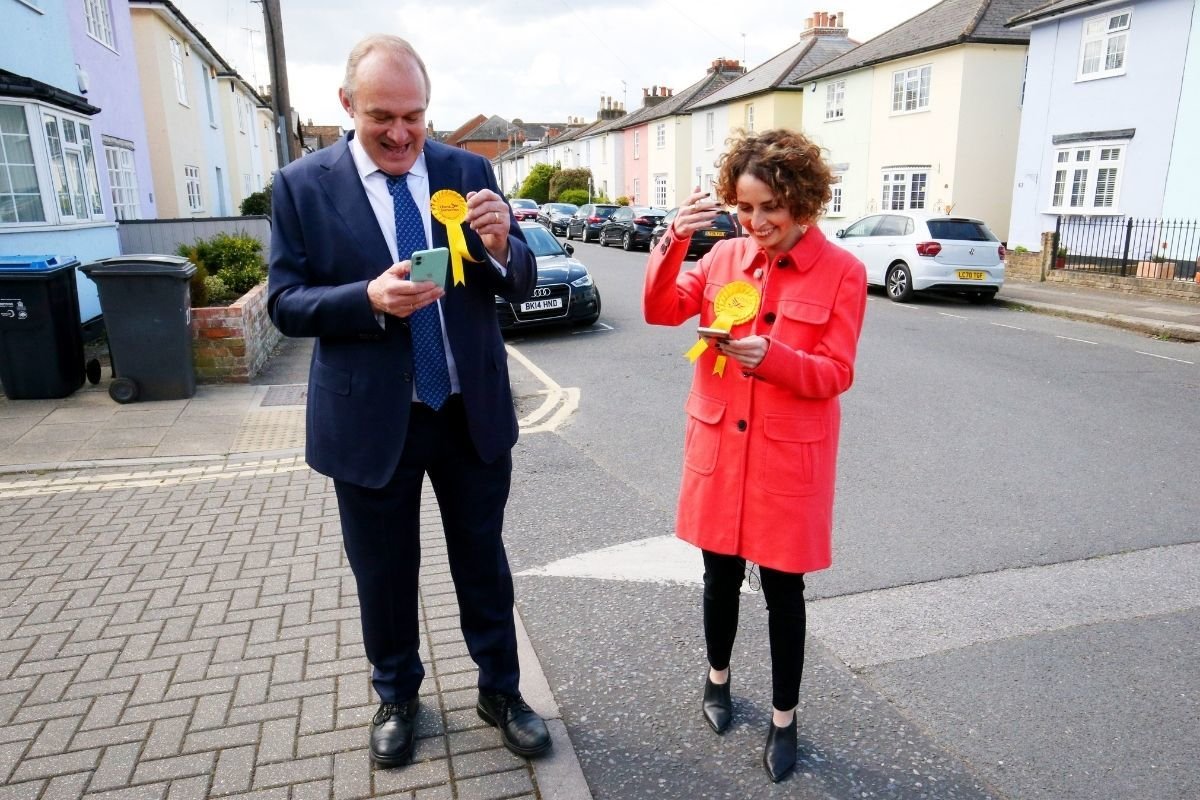 Luisa Porritt and Lib Dem leader Ed Davey questioned voters in southwest London today.  Credit: PA