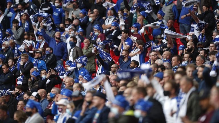 Leicester City fans cheer from the stands