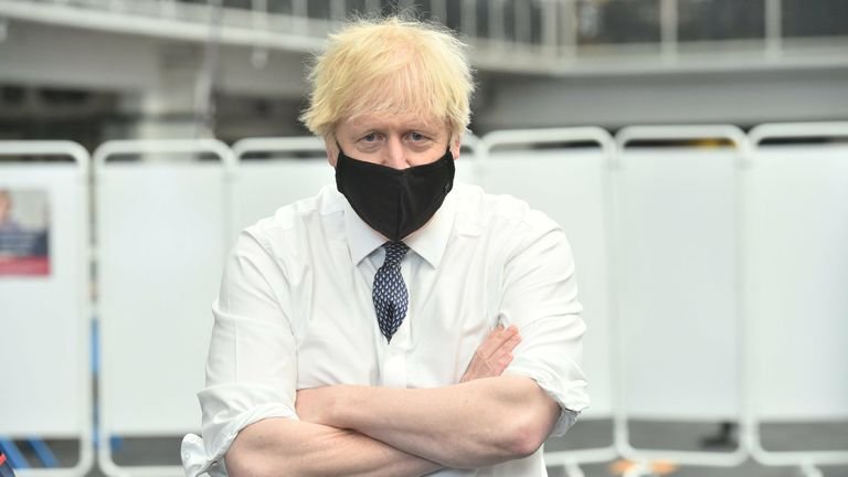 Prime Minister Boris Johnson visits a vaccination center at the Business Design Center in Islington