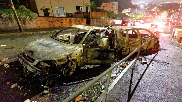 Two of the burned-out cars in Mayhill in Swansea.  Pic: Dimitris Legakis / Athena Pictures / Shutterstock