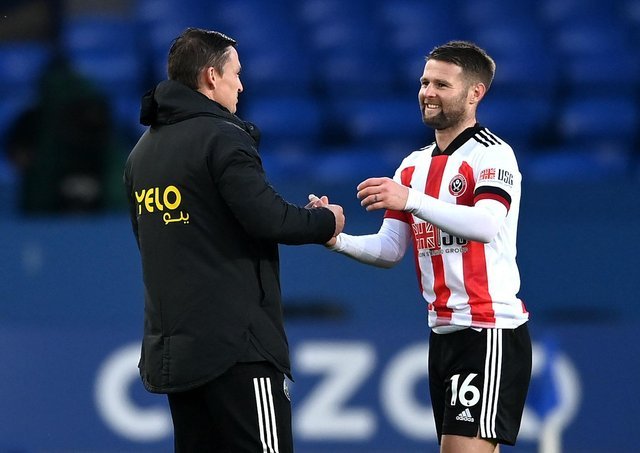 Sheffield United interim manager Paul Heckingbottom (left) and player Oliver Norwood celebrate after the final whistle at Goodison Park: Gareth Copley / PA Wire.