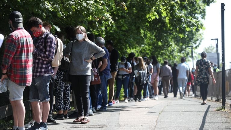 People line up to visit the Belmont Health Center in Harrow, which offers a first dose of Pfizer coronavirus vaccine on Saturday and Sunday to anyone over the age of 18 living or working in Harrow.  Photo date: Saturday, June 5, 2021.