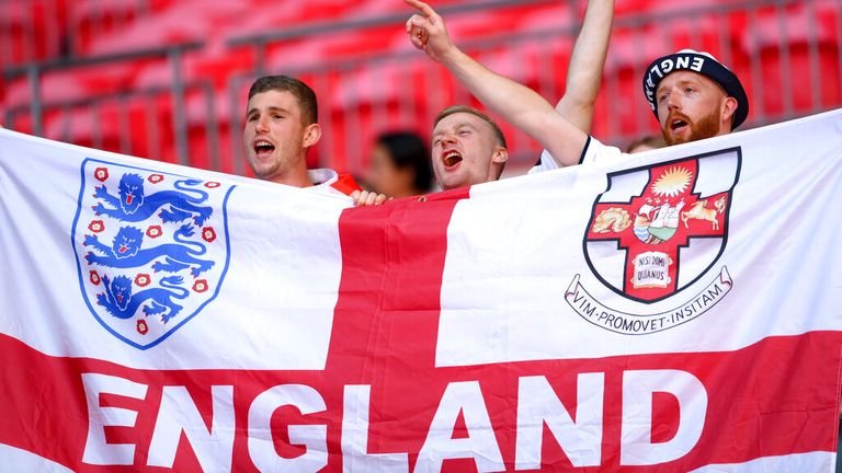 Fans cheer from the stands at Wembley.  Photo: AP