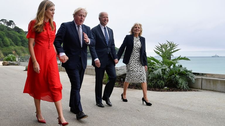Carrie Johnson, Prime Minister Boris Johnson, US President Joe Biden and First Lady Jill Biden walk past the Carbis Bay Hotel