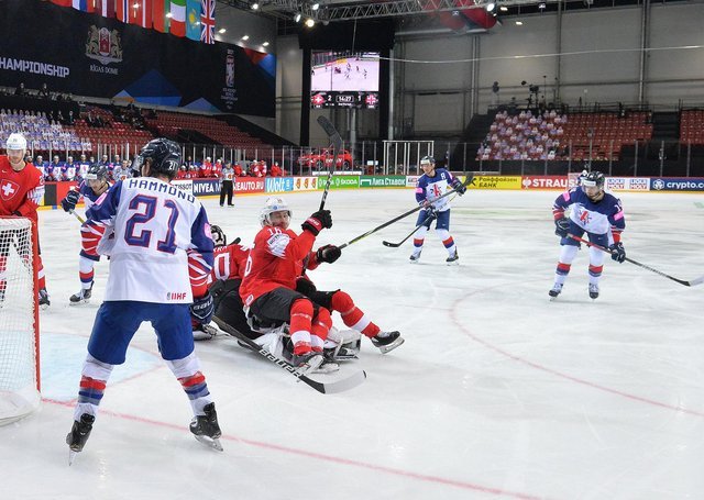 STRIKE TWO: Liam Kirk, far right, shoots on his second goal against Switzerland.  Image: Dean Woolley.