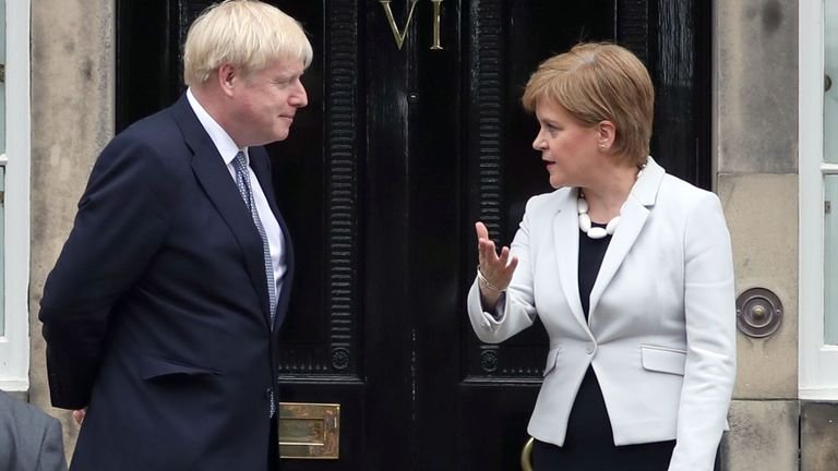 Scottish Prime Minister Nicola Sturgeon greets Prime Minister Boris Johnson outside Bute House in Edinburgh