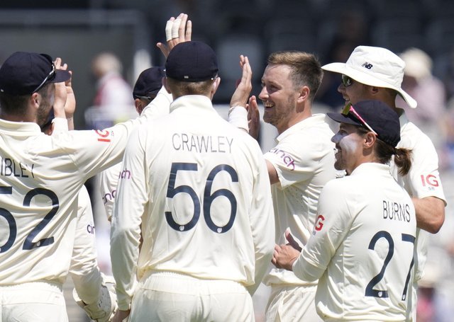FEEDBACK: Ollie Robinson of England, second from right, celebrates the conquest of New Zealand's Colin de Grandhomme's wicket.  Image: Kirsty Wigglesworth.