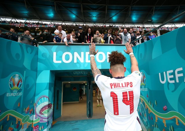 England's Kalvin Phillips acknowledges the fans as he walks through the tunnel at Wembley.  (Photo by Alex Morton - UEFA / UEFA via Getty Images)