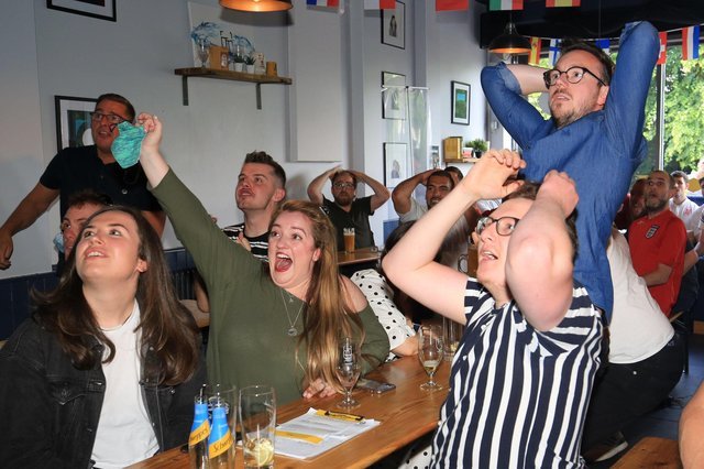 Fans watch England beat Germany in Euro 2020 at Two Thirds Beer Co in Sheffield.  Photo: Chris Etchells