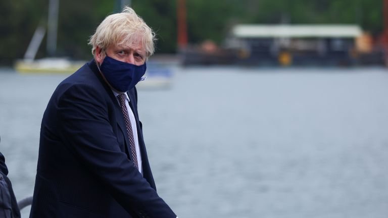 Prime Minister Boris Johnson arrives by boat for a tour of Scott Woyka Furniture's workshop in Falmouth, ahead of the G7 summit in Cornwall.  Photo date: Thursday, June 10, 2021.
