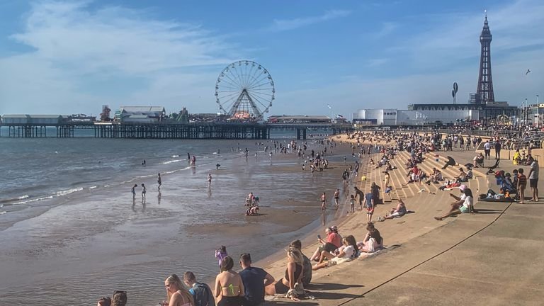 People are enjoying the sun on Blackpool beach as Bank Holiday Monday could be the hottest day of the year so far - with temperatures forecast to reach 25C in parts of the UK