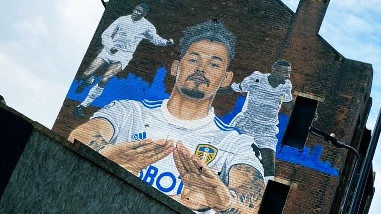 The Kalvin Phillips mural in central Leeds which was painted by street artist Akse in winter.  He appears alongside Leeds United legends Lucas Radebe and Albert Johanneson 