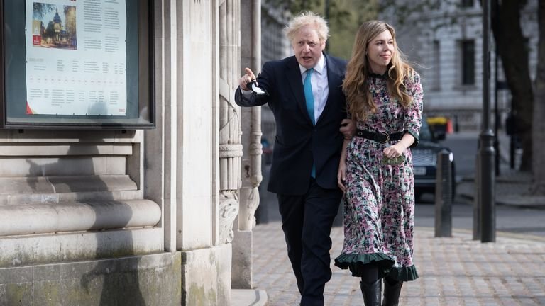 Prime Minister Boris Johnson and his fiancee Carrie Symonds leave after voting at Methodist Central Hall in central London in the London local and mayor elections.  Photo date: Thursday, May 6, 2021.