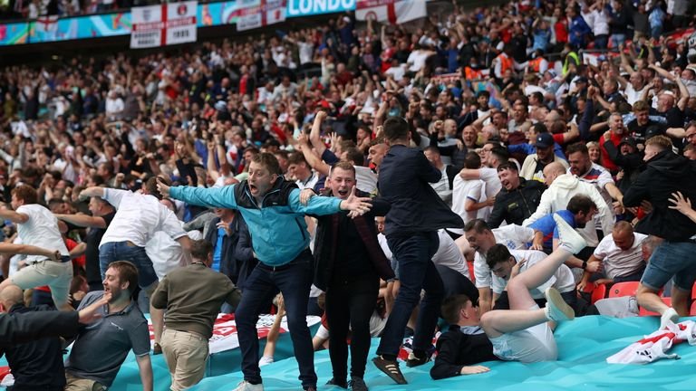 Soccer Football - Euro 2020 - Round of 16 - England v Germany - Wembley Stadium, London, Great Britain - June 29, 2021 English fans celebrate their first goal scored by Raheem Sterling Pool via REUTERS / Carl Recine TPX IMAGES OF THE DAY