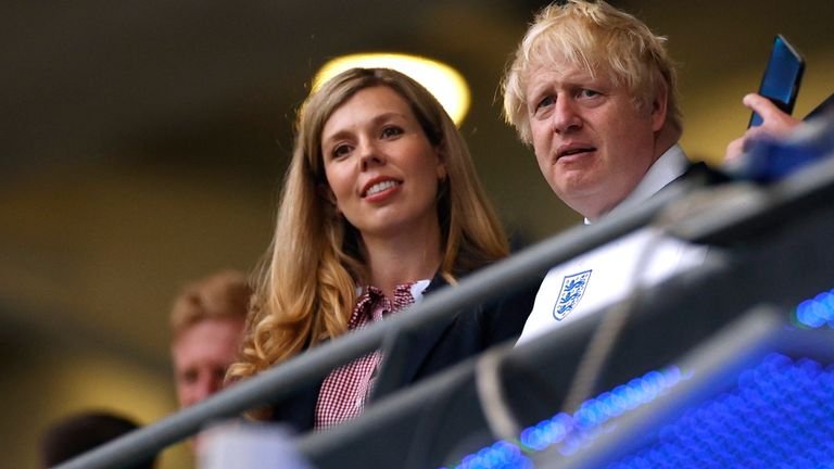 Soccer Football - Euro 2020 - Final - Italy v England - Wembley Stadium, London, Great Britain - July 11, 2021 British Prime Minister Boris Johnson with his wife Carrie Johnson before the Pool match via REUTERS / John Sibley