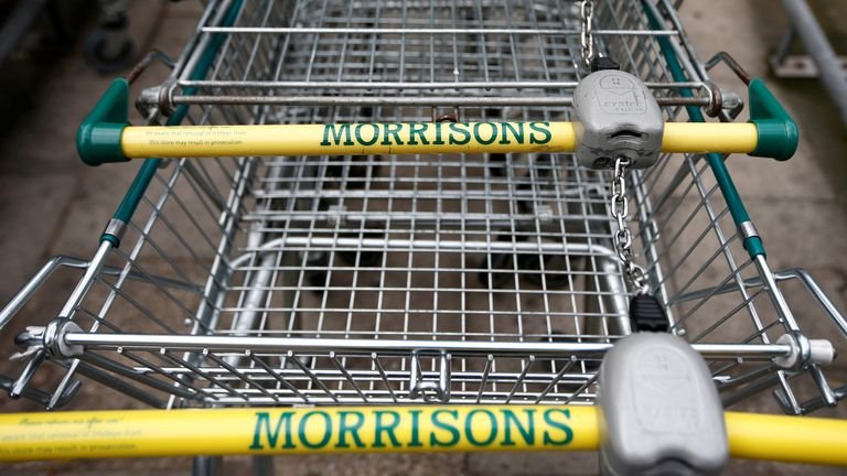 Shopping trolleys are parked in a Morrisons supermarket in south London