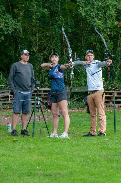 The Argus: Bryony Pitman with his father Gary Kinghorn (left) and Olympic medalist Alec Potts at the Worthing Archery Club.  Credit: Gary Oldmeadow