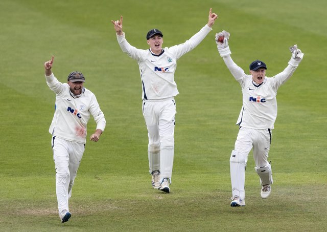 Yorkshire's Harry Duke, right, leads the celebrations after catching Simon Kerrigan.  Image: Andy Kearns / Getty Images