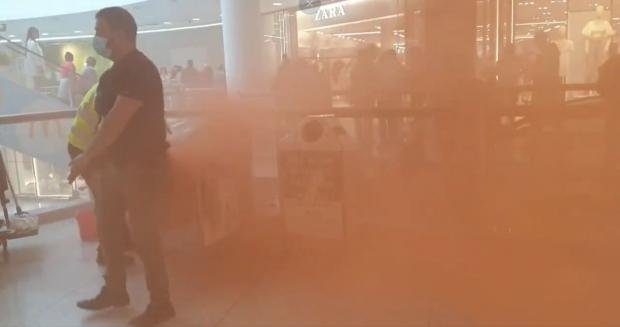 The Argus: A smoke bomb was set off in Churchill Square during a protest against the new Covid vaccination center in Brighton 