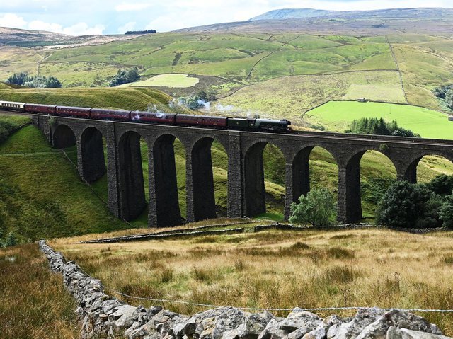 The Flying Scotsman makes its way over the Arten Gill Viaduct in the Yorkshire Dales.