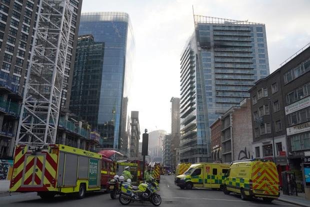 Times Series: About 15 fire engines and 125 firefighters attended the Whitechapel fire.  Photo: PA