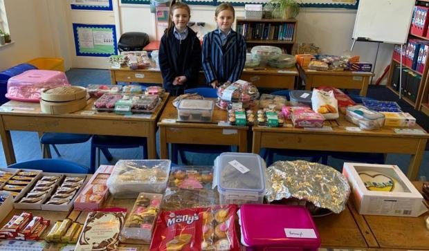The Argus: Hayley, left, and Emma, ​​right, held a bake sale to raise money for Ukraine