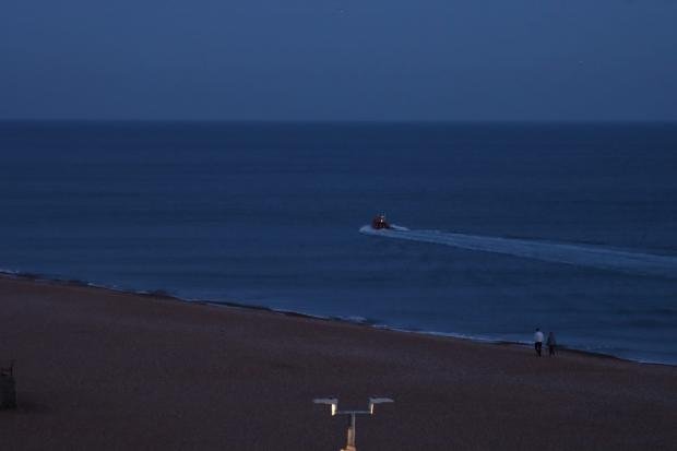 The Argus: Paddle surfers have difficulty near Brighton Palace Pier.  Credit: RNLI 