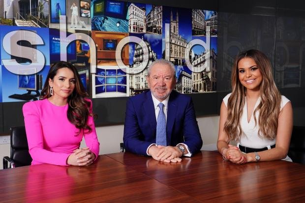 Times Series: The finalists of the latest series of the BBC program The Apprentice, Harpreet Kaur and Kathryn Burn with Lord Sugar in the meeting room at Amshold House in Loughton, Essex (PA)