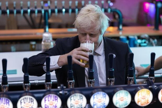 The Argus: PM Boris Johnson at Fourpure Brewery in London October 2021