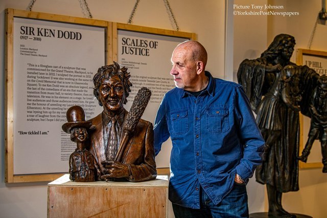 Sculptor Graham Ibbeson with his latest work by Sir Ken Dodd.  Photo Tony Johnson
