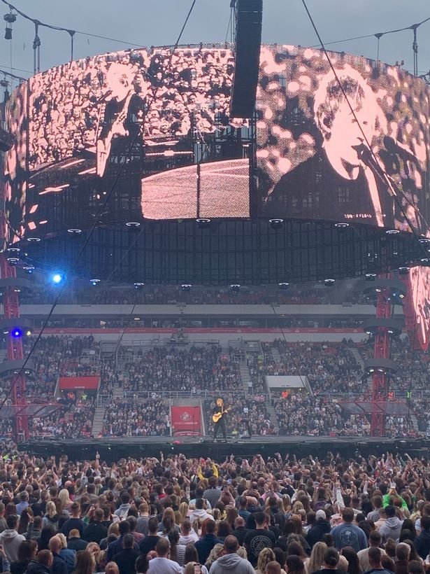 Ed Sheeran performing in front of 60,000 fans at Sunderland's Stadium of Light