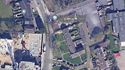 Times Series: Aerial view of the development site next to Coppetts Wood Primary School.  Credit: Google Maps