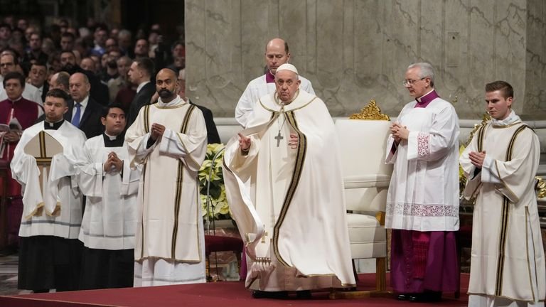 Pope Francis presides over Christmas eve Mass, at St. Peter&#39;s Basilica at the Vatican, Sunday Dec. 24, 2023. (AP Photo/Gregorio Borgia)