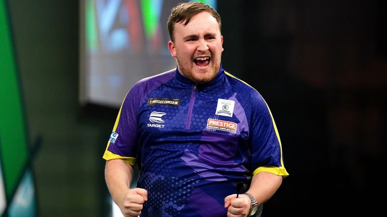 Luke Littler reacts during his match against Rob Cross